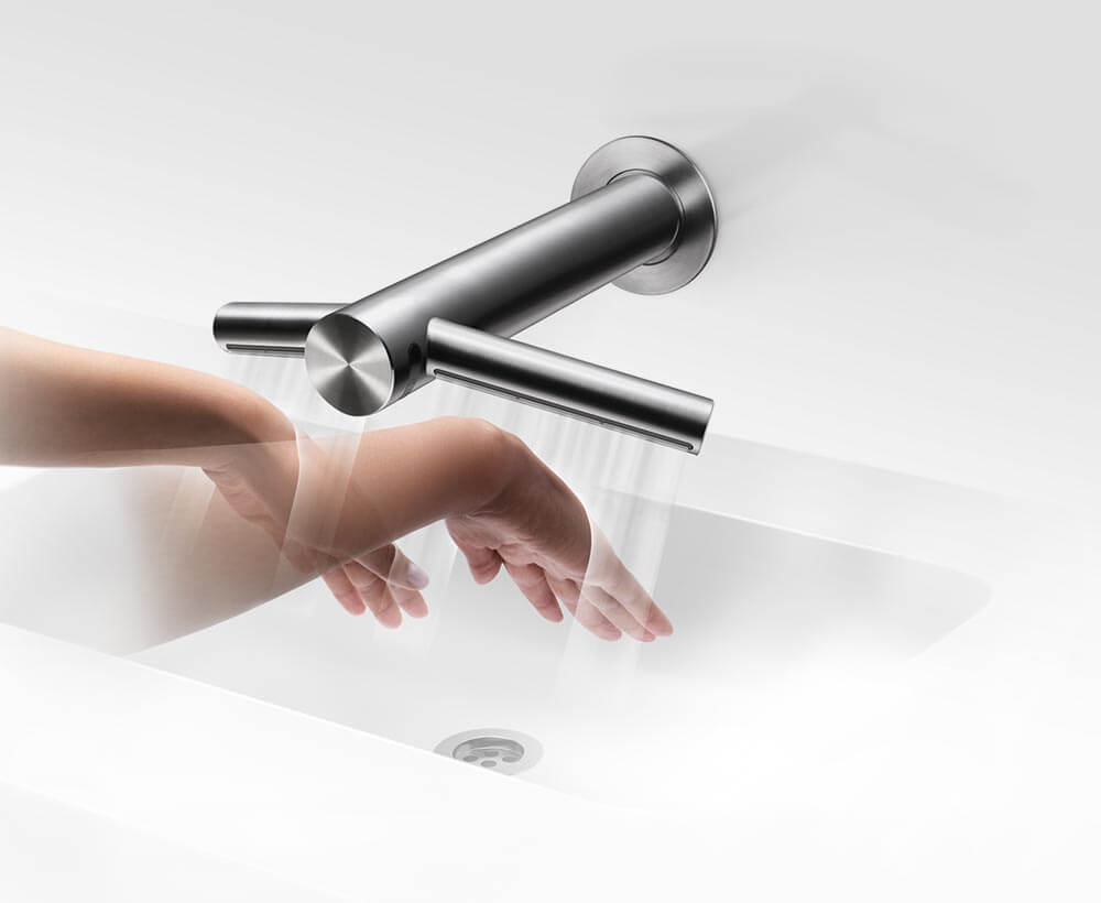 Dyson Airblade Wash+Dry hand dryer wash and dry hands at the sink